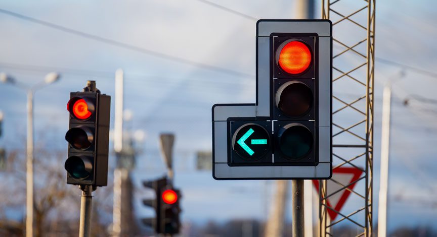 traffic-signals-showing-a-red-light-and-a-green-left-turn-arrow