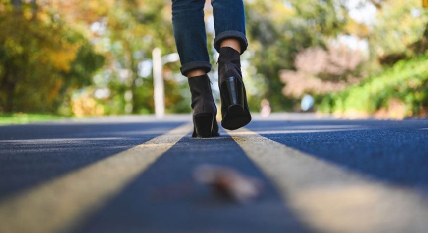 view-from-the-ground-of-someone-crossing-the-street